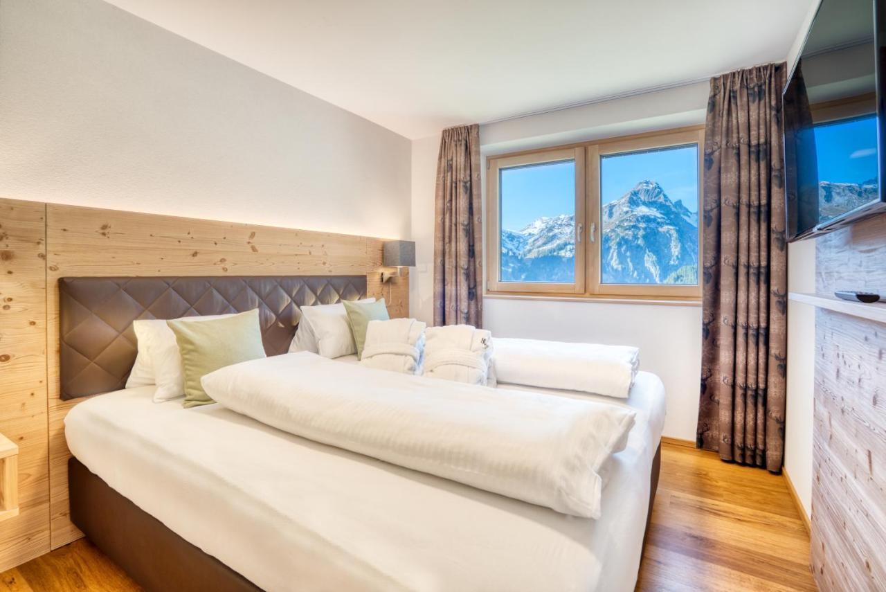 Апартаменты Hus23 With Wellness Шрёккен Экстерьер фото