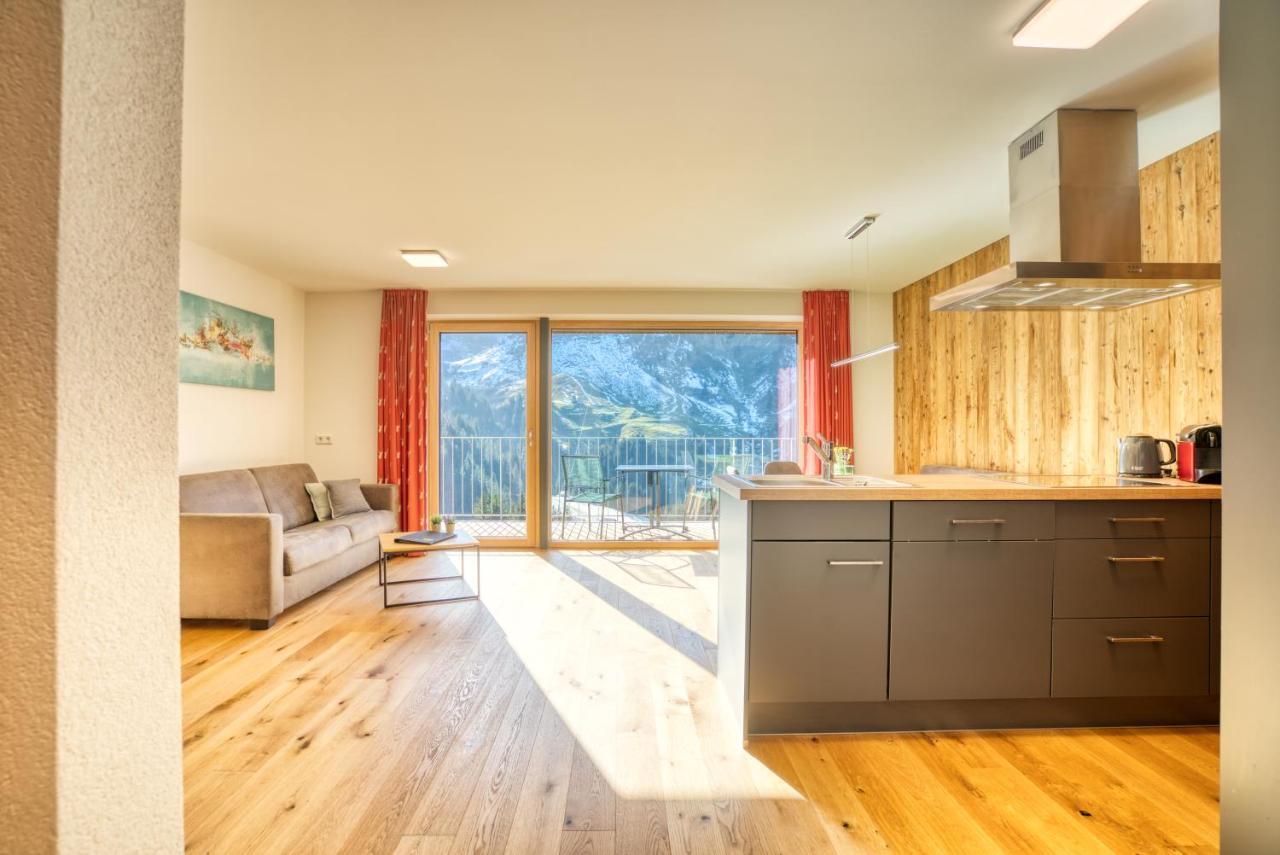 Апартаменты Hus23 With Wellness Шрёккен Экстерьер фото